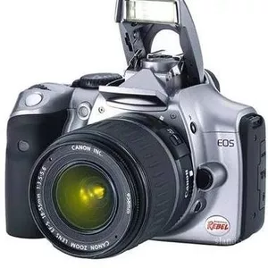 Продам фотоаппарат Canon Eos 350 D + бустер Bg E-3 +много чего 